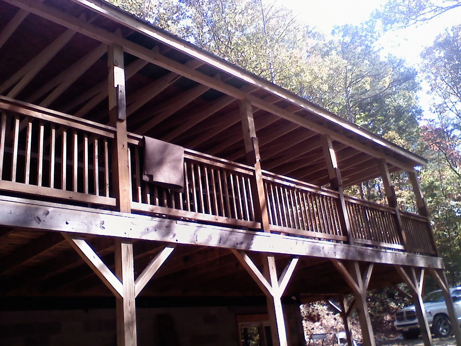 Timber framing under a new elevated porch and deck — Roof Leak Repair in Healdton by Roofing Brothers